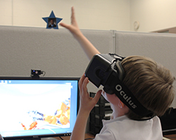A student tests out the Oculus Rift headset.