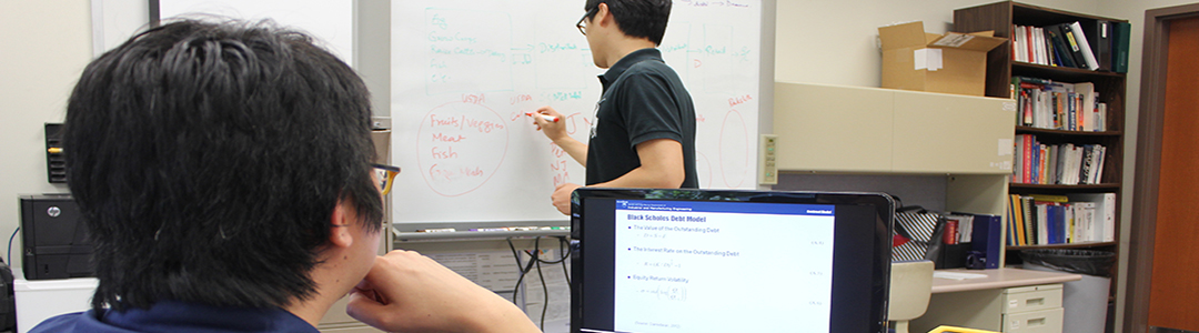 Penn State industrial engineering graduate students doing work in the DISCRETE Lab.