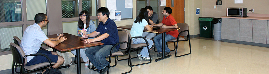 Penn State industrial engineering students in the graduate student lounge in Leonhard Building.