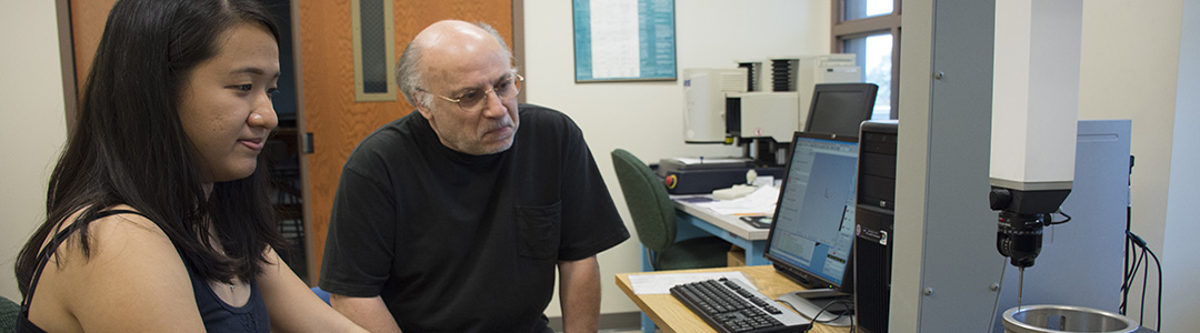 Professor Amine Lehitet and an industrial engineering student in the Precision and Quality Measurements Lab in the department of industrial and manufacturing engineering at Penn State.