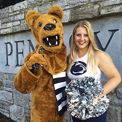 Duffett strikes a pose with the Nittany Lion.