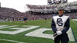 Greg Zuber on the field at Beaver Stadium before a home football game.
