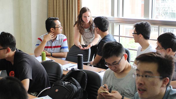 Junior mechanical engineering student Kate Ferster works with engineering students in China in 2016.