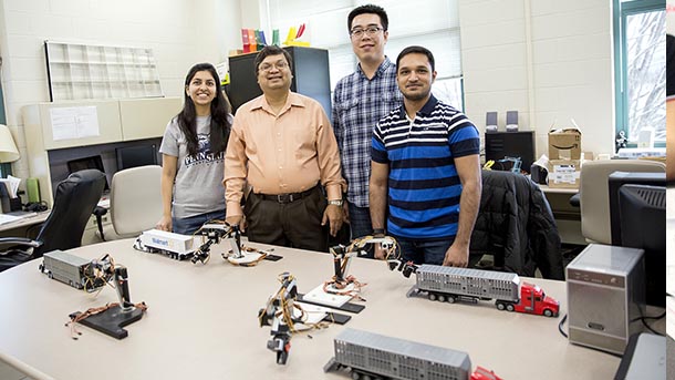 Professor Vittal Prabu, Rakshith Badarinath and two other graduate students in Prabhu's lab