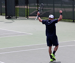 Marc Collado celebrates a win on the tennis court.
